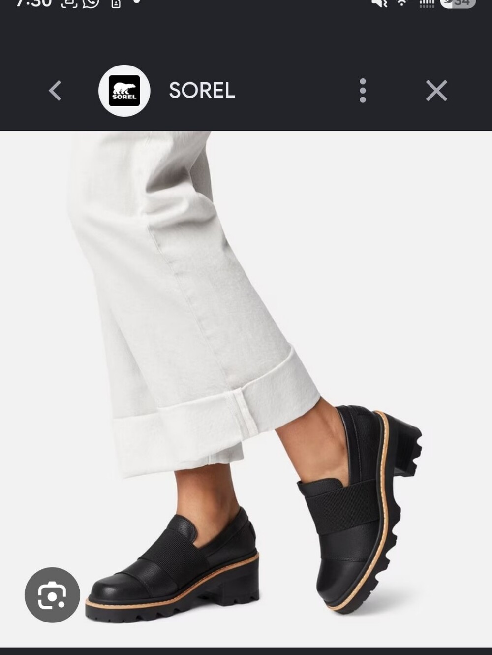 Sorel Black Platform Slip-On Loafers with Tan Trim